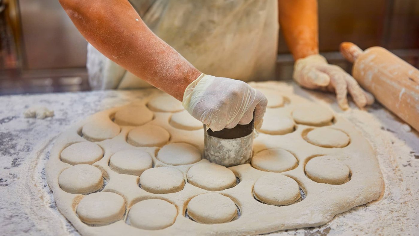 Fresh biscuits being cut by hand at The Loveless Cafe